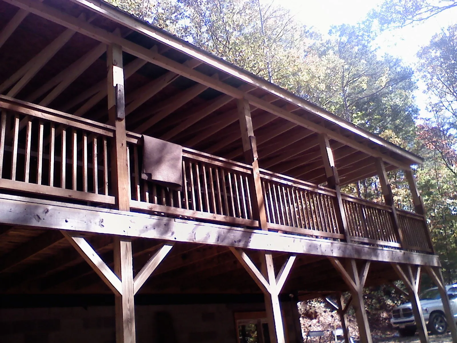 Timber framing under a new elevated porch and deck — Roof Leak Repair in River Forest by Roofing Brothers